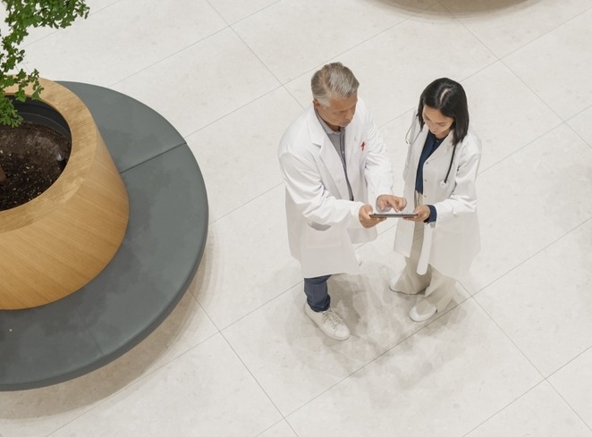 Female,Doctor,Meeting,A,Male,General,Practitioner,In,The,Main
